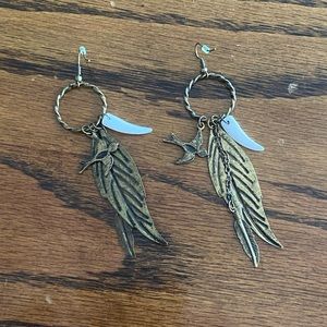 Gold feather earrings